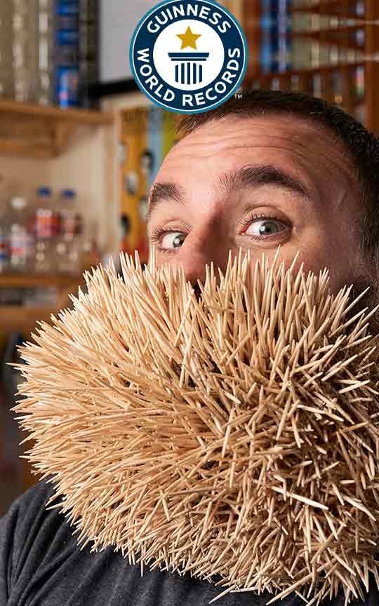 Man sets world record with beard, toothpicks